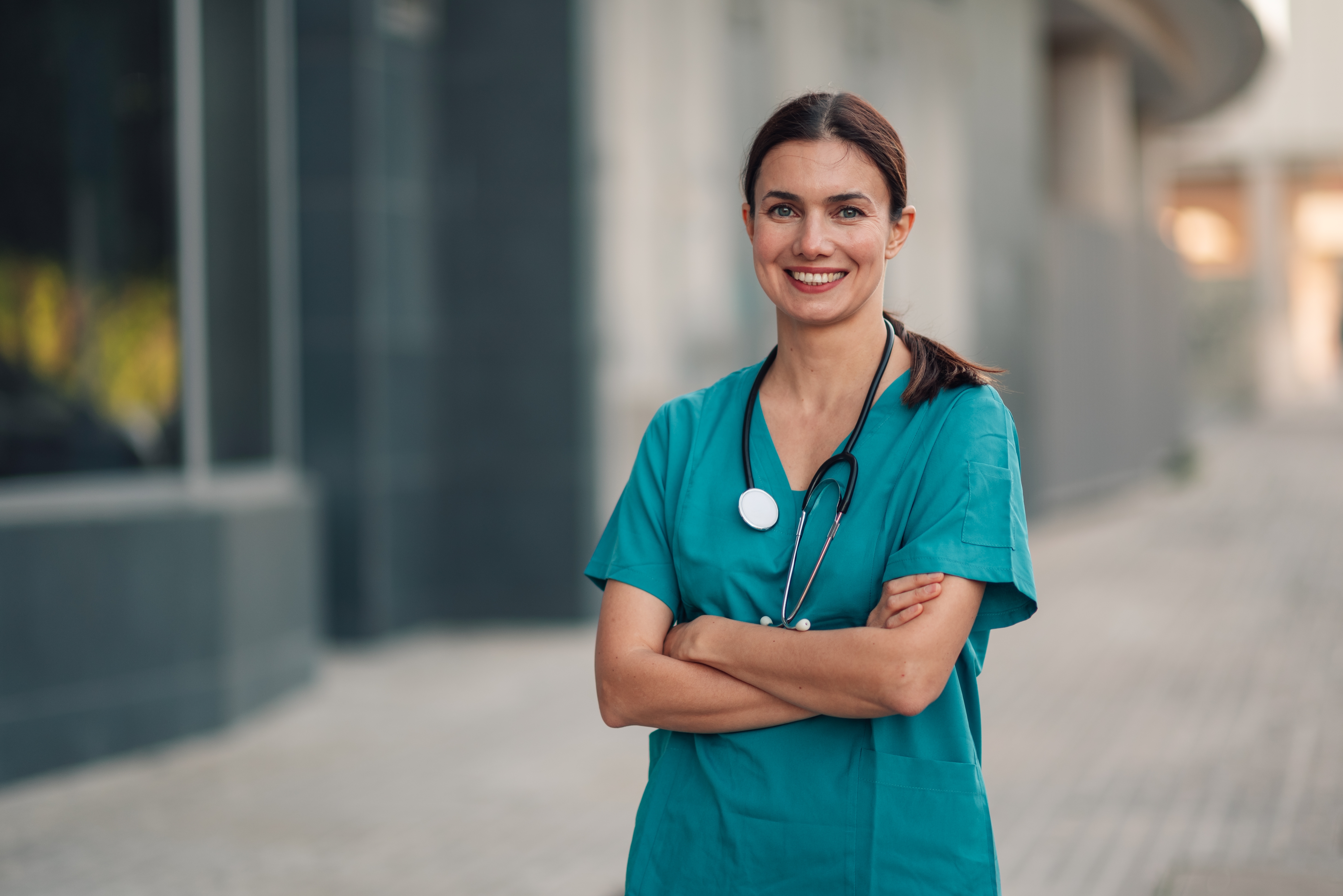 Nursing team in teal scrubs
